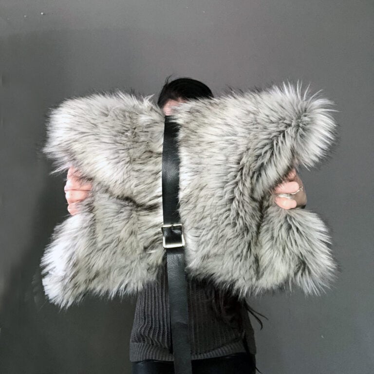 How to DIY this belted faux fur purse clutch laptop holder from scratch. See the full step by step tutorial