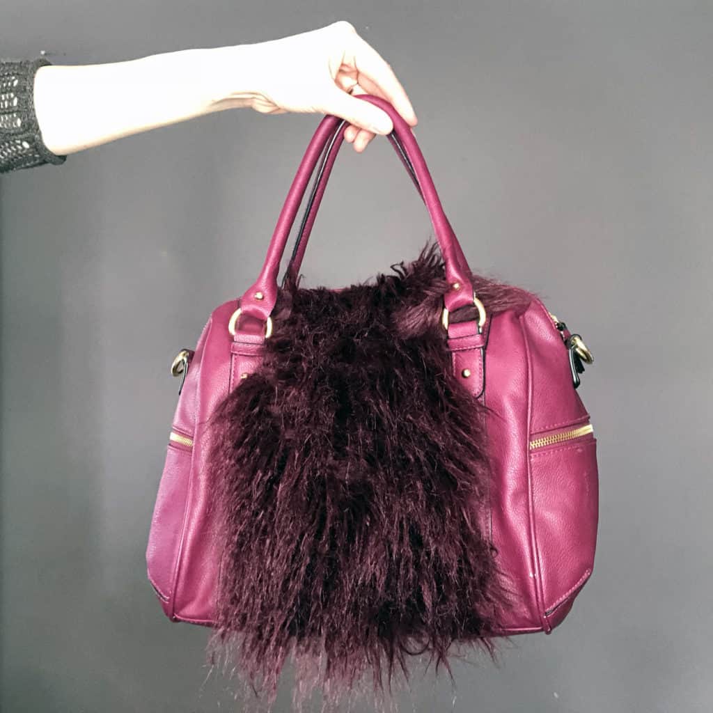 How to add a fur embellishment to an old purse. A simple refashion DIY tutorial