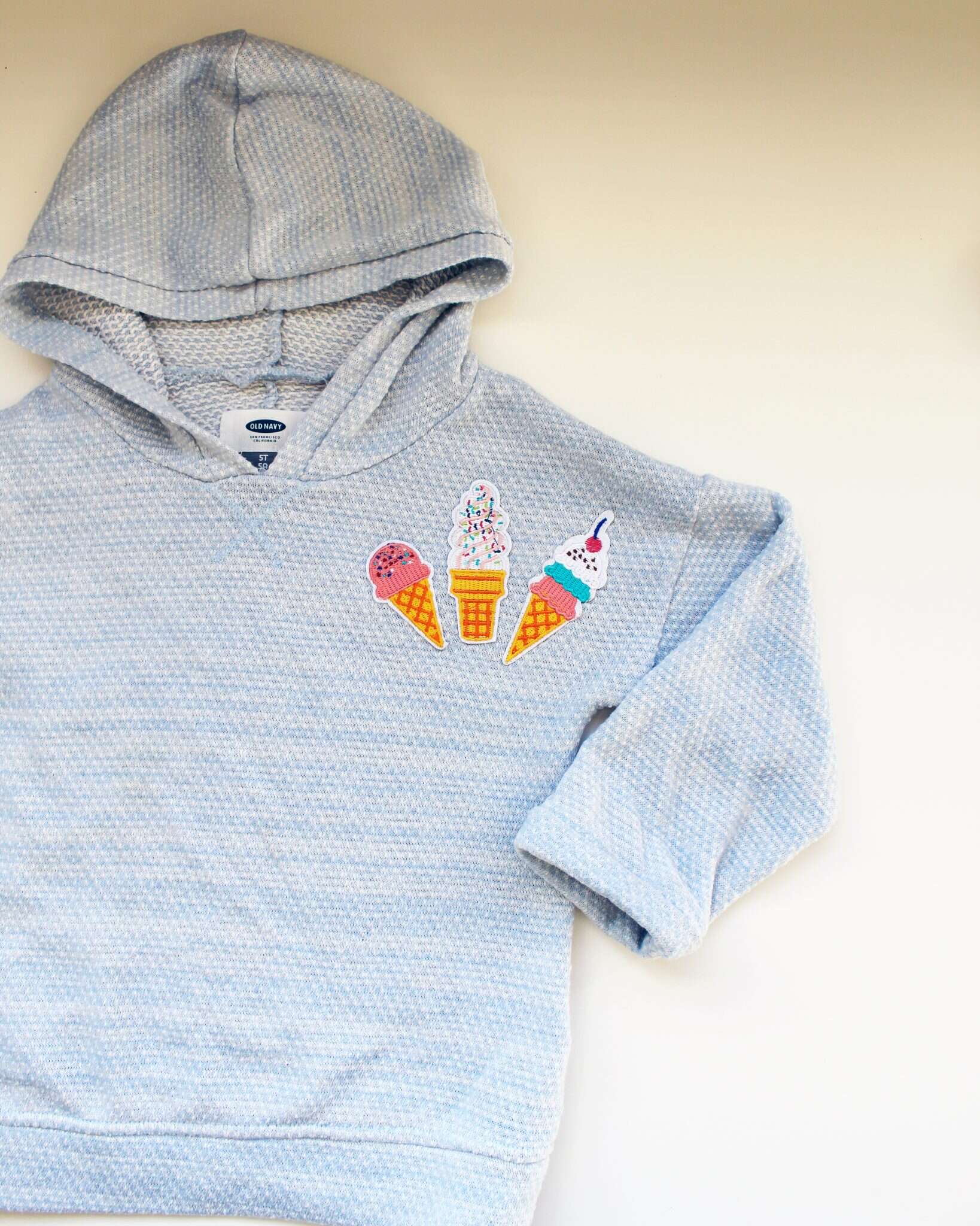 How to sew on a patch 4